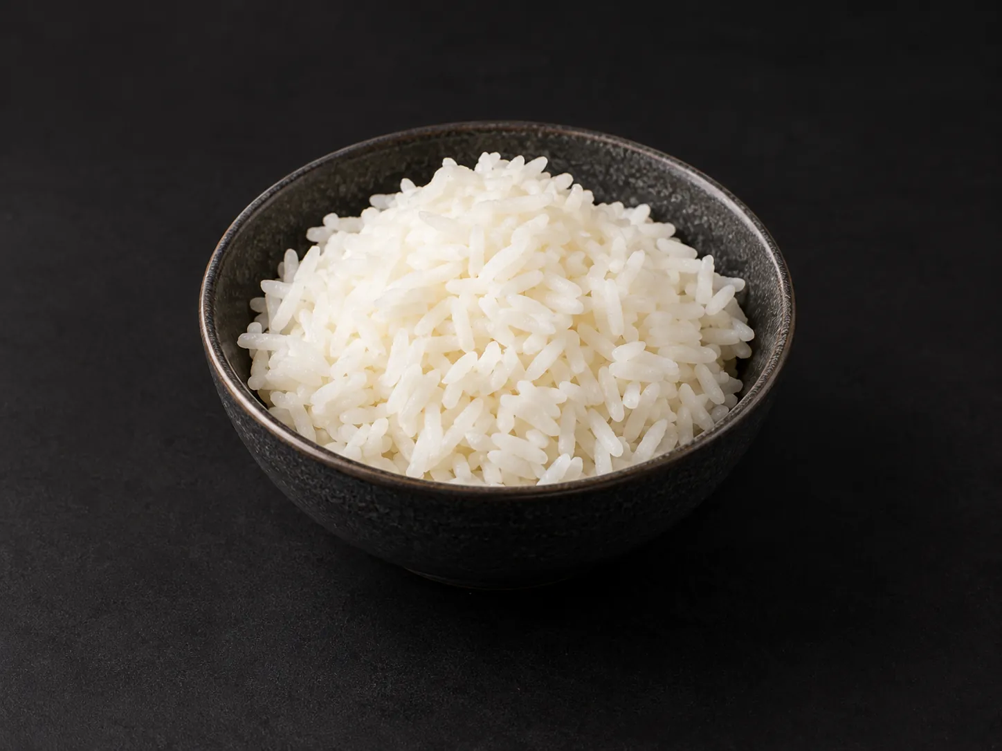 Imagen referencial de Porción de arroz de Calle Fast Food.