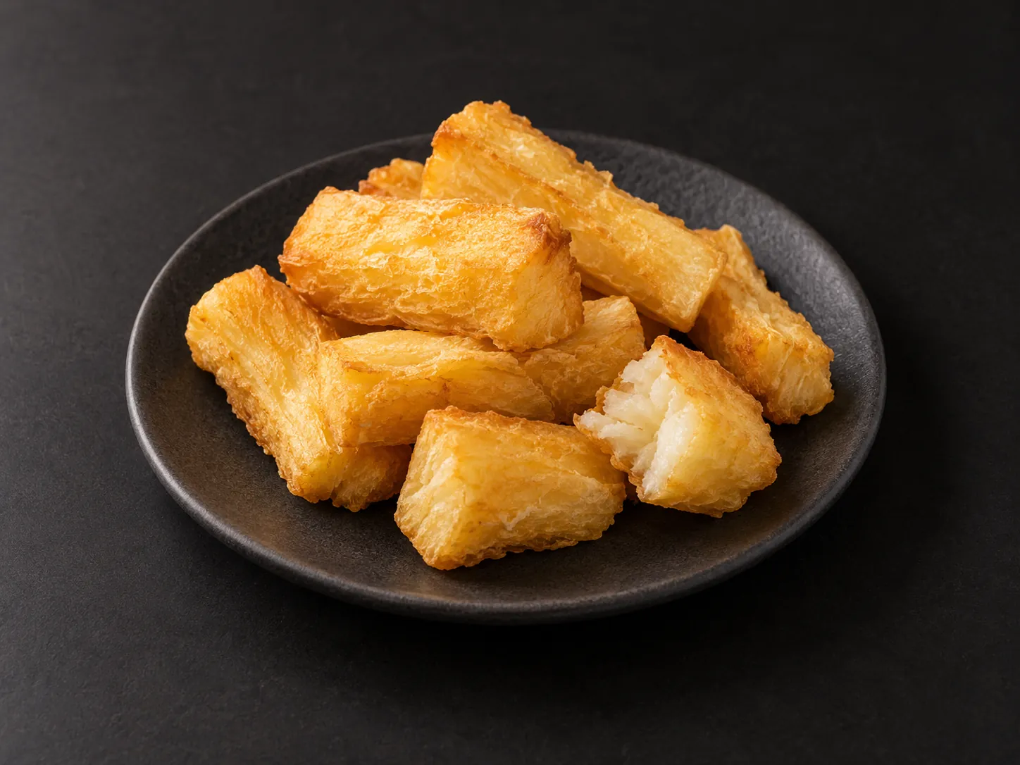 Imagen referencial de Porción de yuca de Calle Fast Food.
